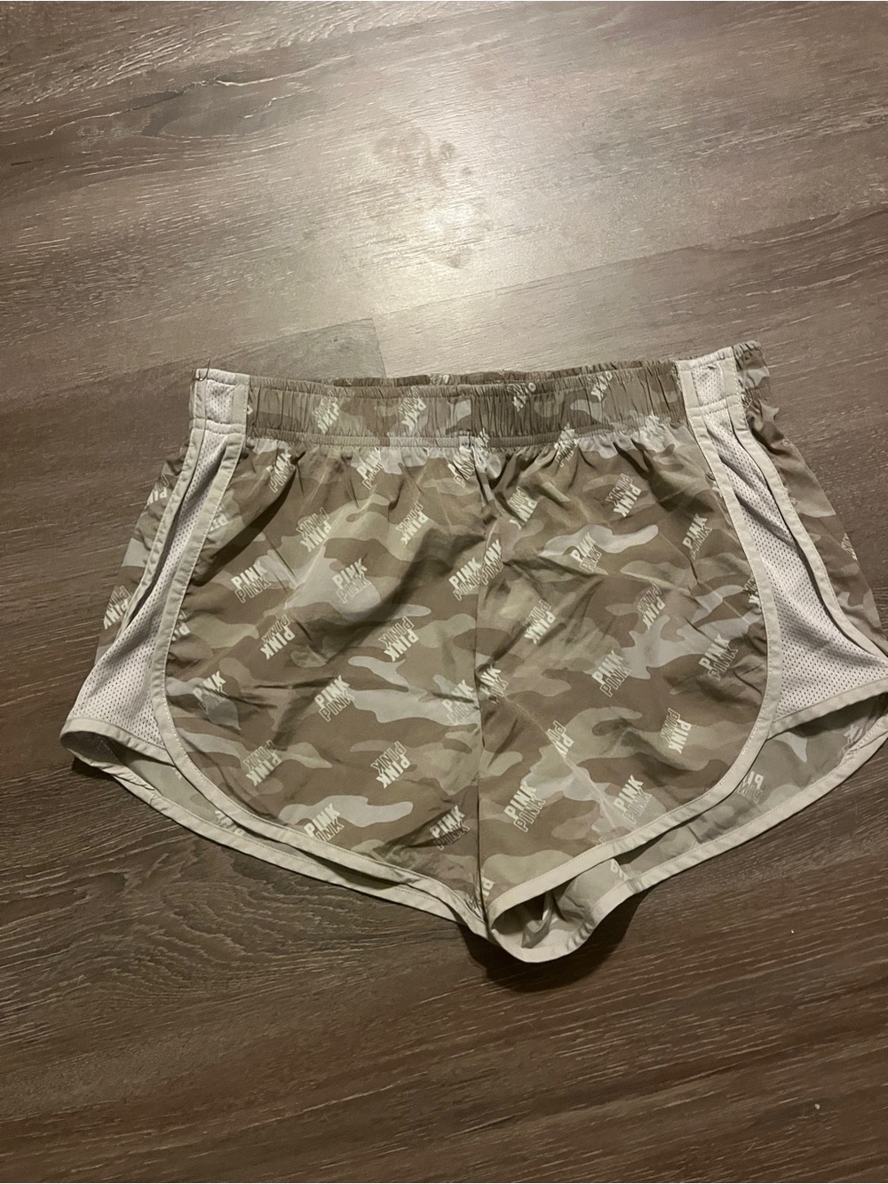 Victoria's Secret PINK camo shorts with repeating 'PINK' text #camouflage #activ